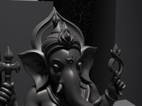 Ganesh murti statue in black, close detail of the face and hands