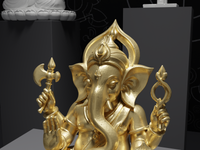 Ganesh murti statue in gold, detail of the face and hands