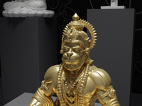 Hanuman statue in Gold, detail of the face and hands